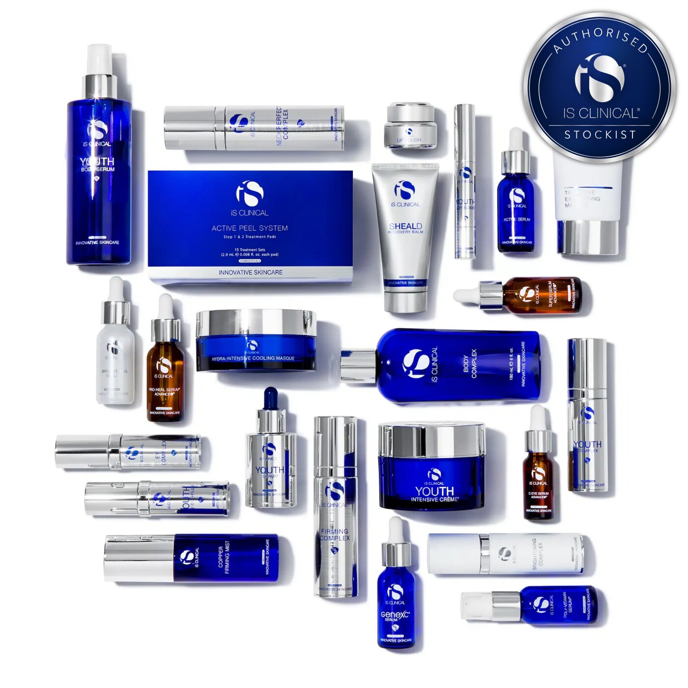 A flat-lay arrangement of iS CLINICAL skincare products and boxes on a white background, with the iS Clinical Authorised Stockist seal in the top-right corner